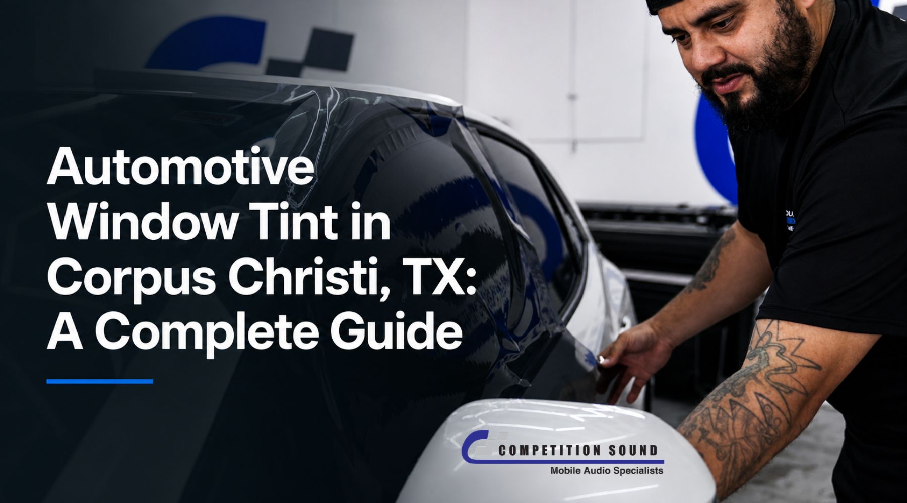Professional installer applying automotive window tint to a vehicle in Corpus Christi, Texas