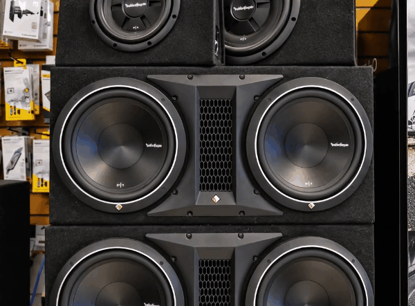 Rockford Fosgate subwoofers in display enclosures, showcasing powerful bass options for custom car audio systems.